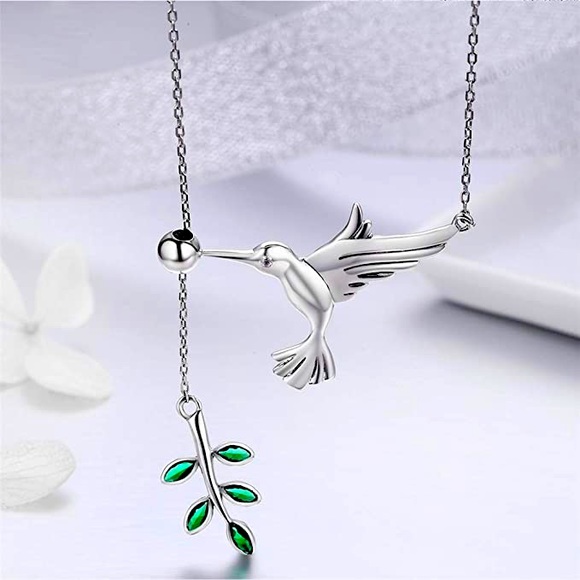 lolas_boutique_ Jewelry - 925 silver hummingbird necklace emerald stones